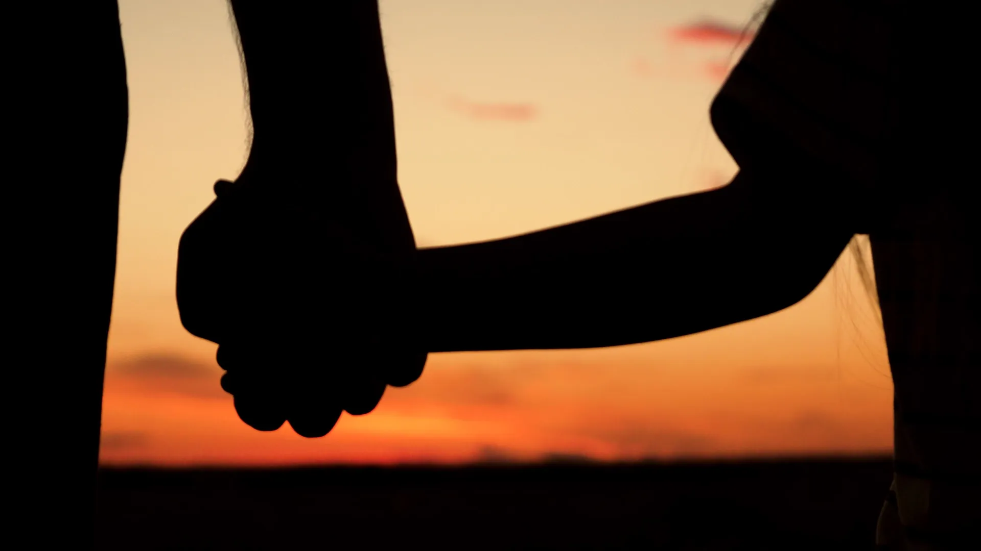 Holding Hands Sunset